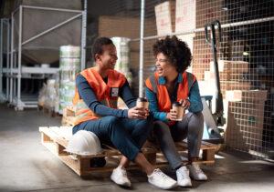 Two women talking at work