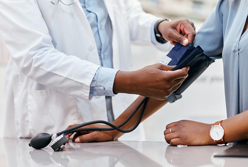 patient receives blood pressure check